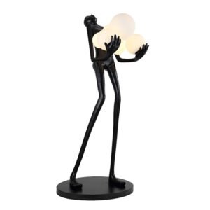 Sculpture holding ball floor lamp